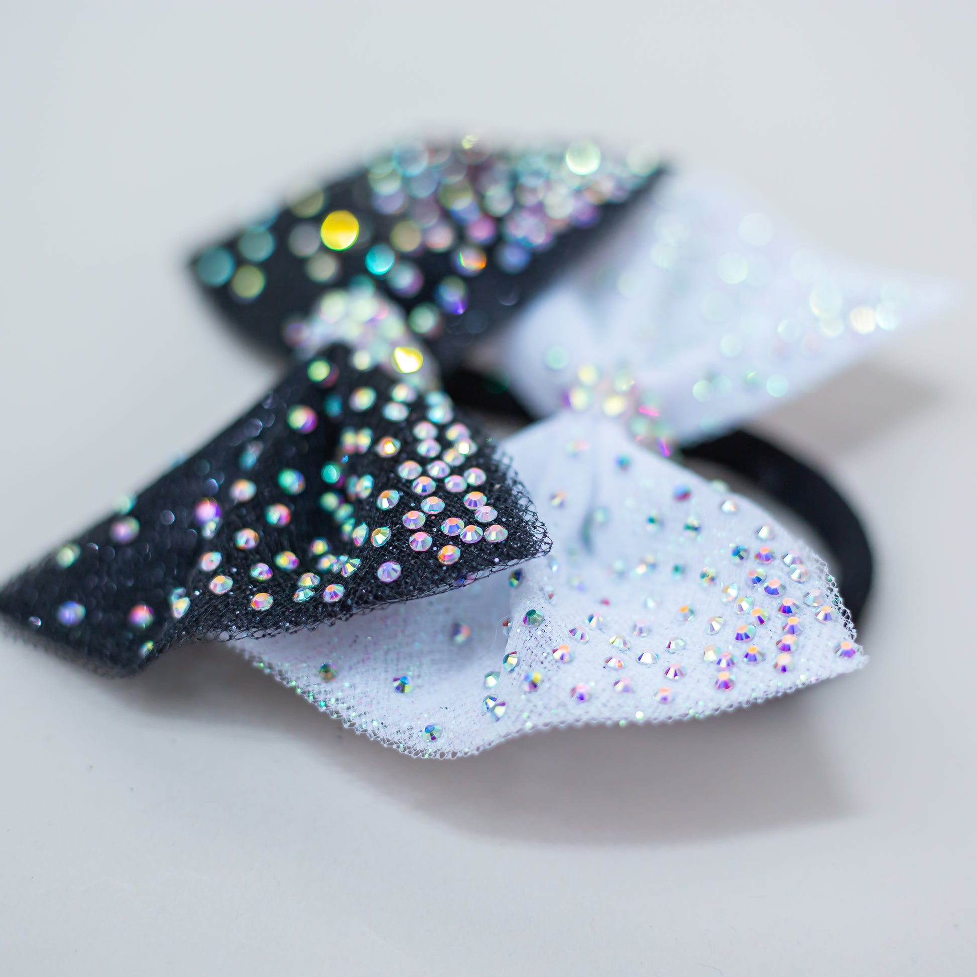 Rhinestone dipped hair bow for competition day, cbcsportswear
