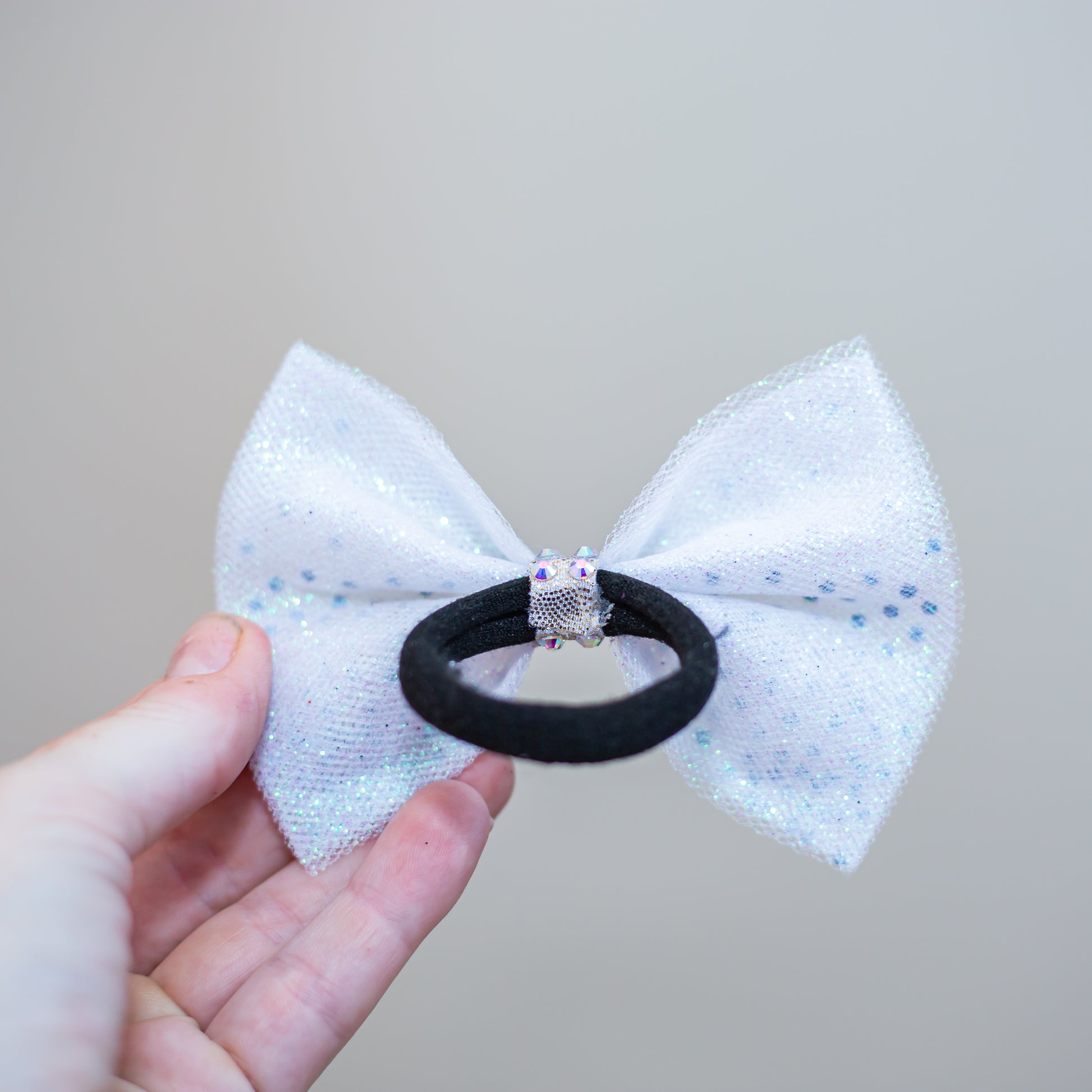 Rhinestone dipped hair bow for gymnastics competition, cbcsportswear