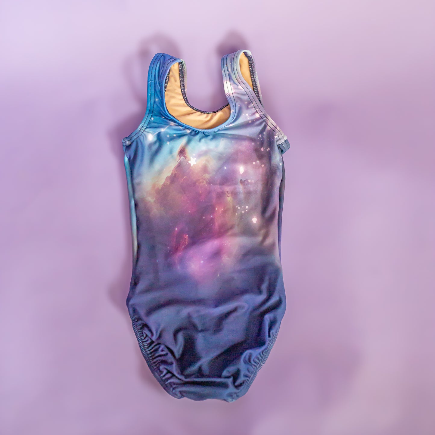 Star and nebula print detail on personalized gymnastics leotard, cbcsportswear