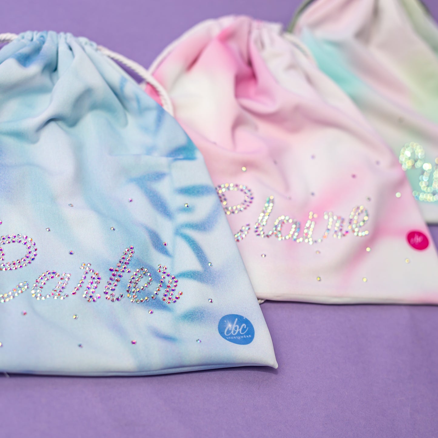 Rhinestone watercolor grip bags shown in all available colors, cbcsportswear