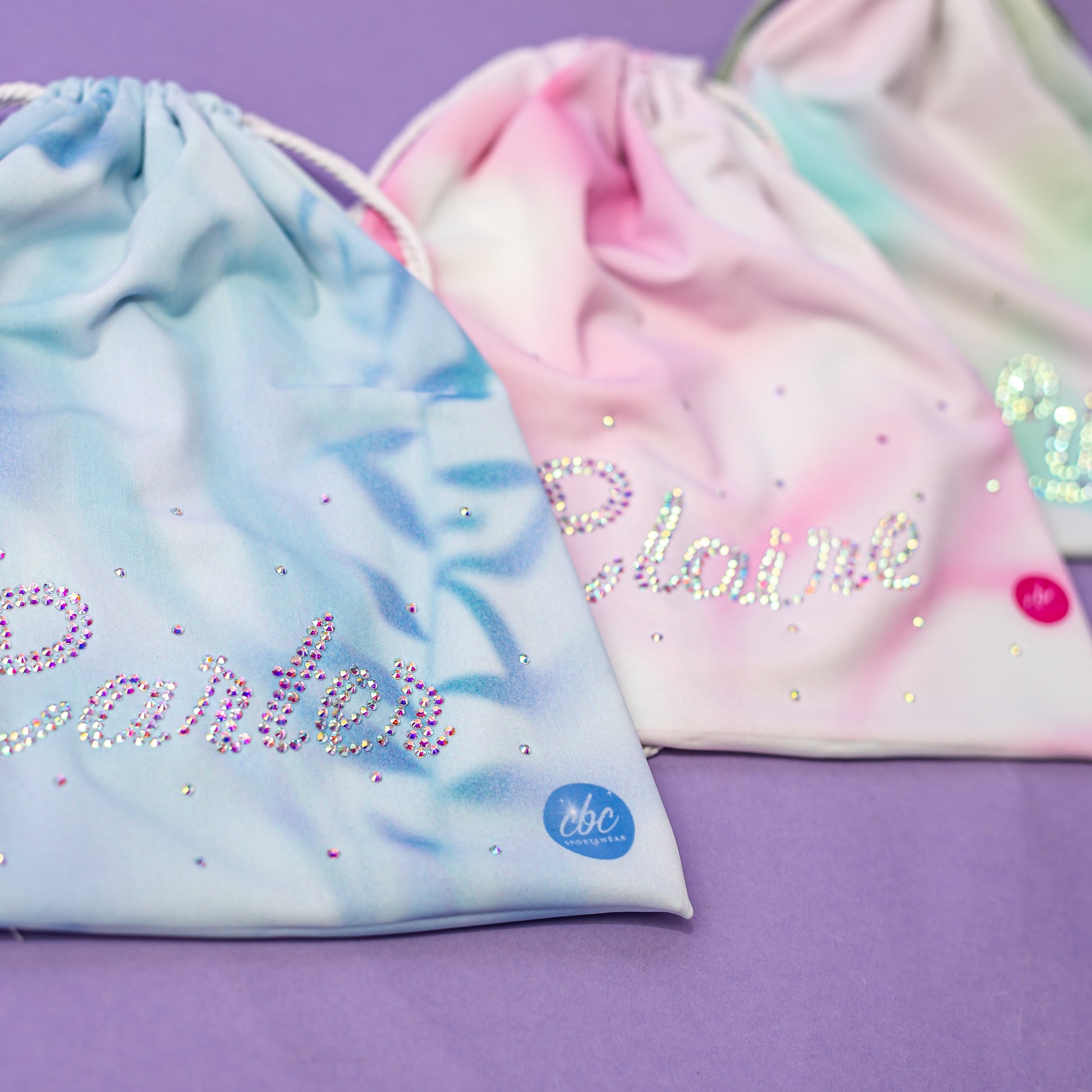 Rhinestone watercolor grip bags shown in all available colors, cbcsportswear