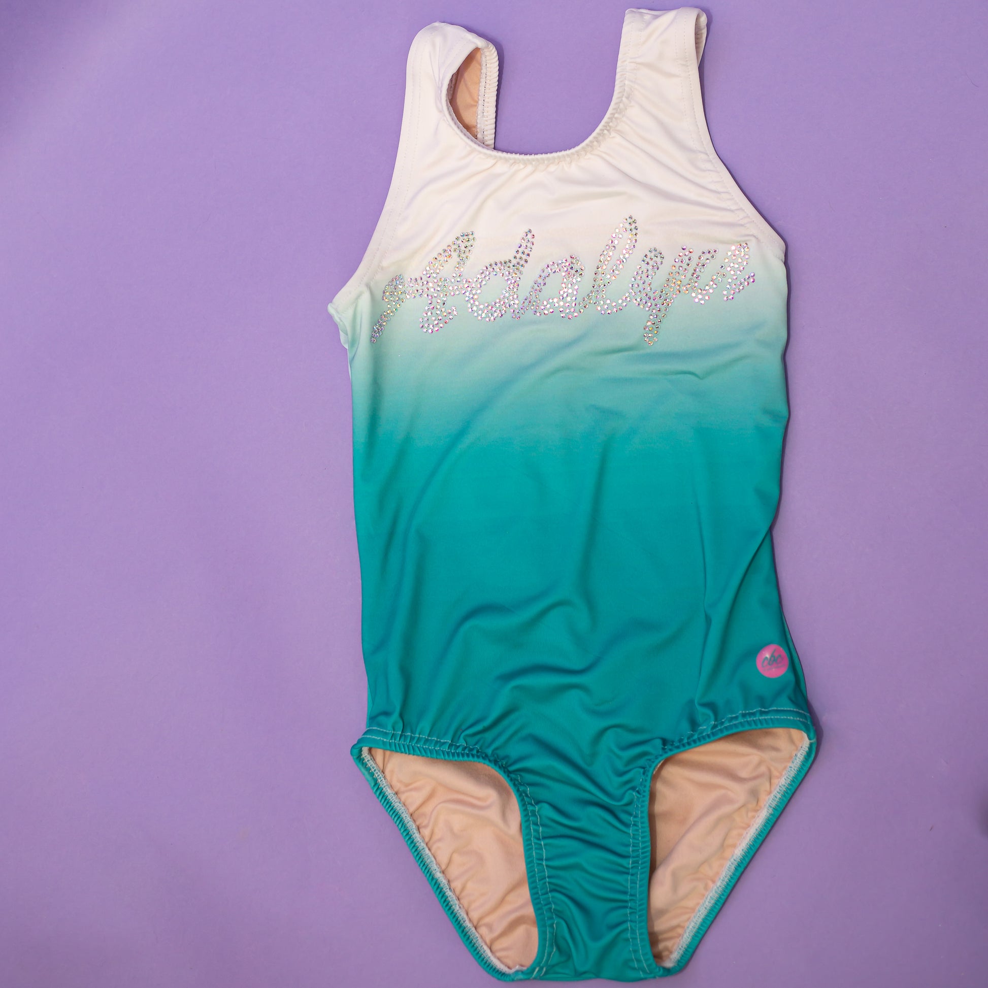 Ombre gymnastics leotard with personalized rhinestone name, cbcsportswear