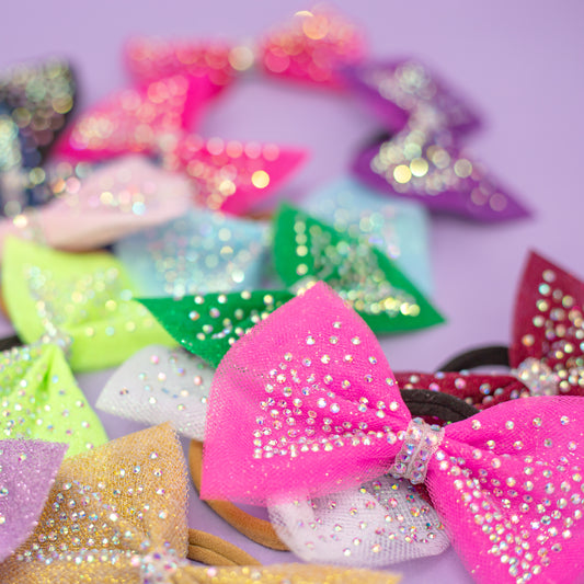 Rhinestone dipped gymnastics hair bows in multiple colors, cbcsportswear