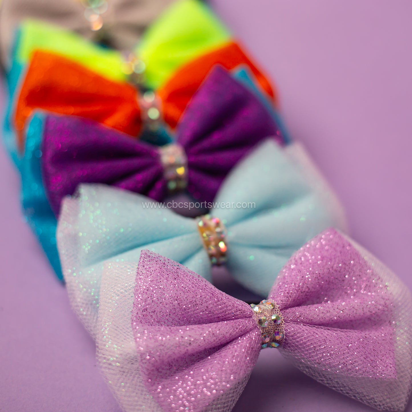 Custom gymnastics hair bow, rhinestone and glitter tulle, cbcsportswear