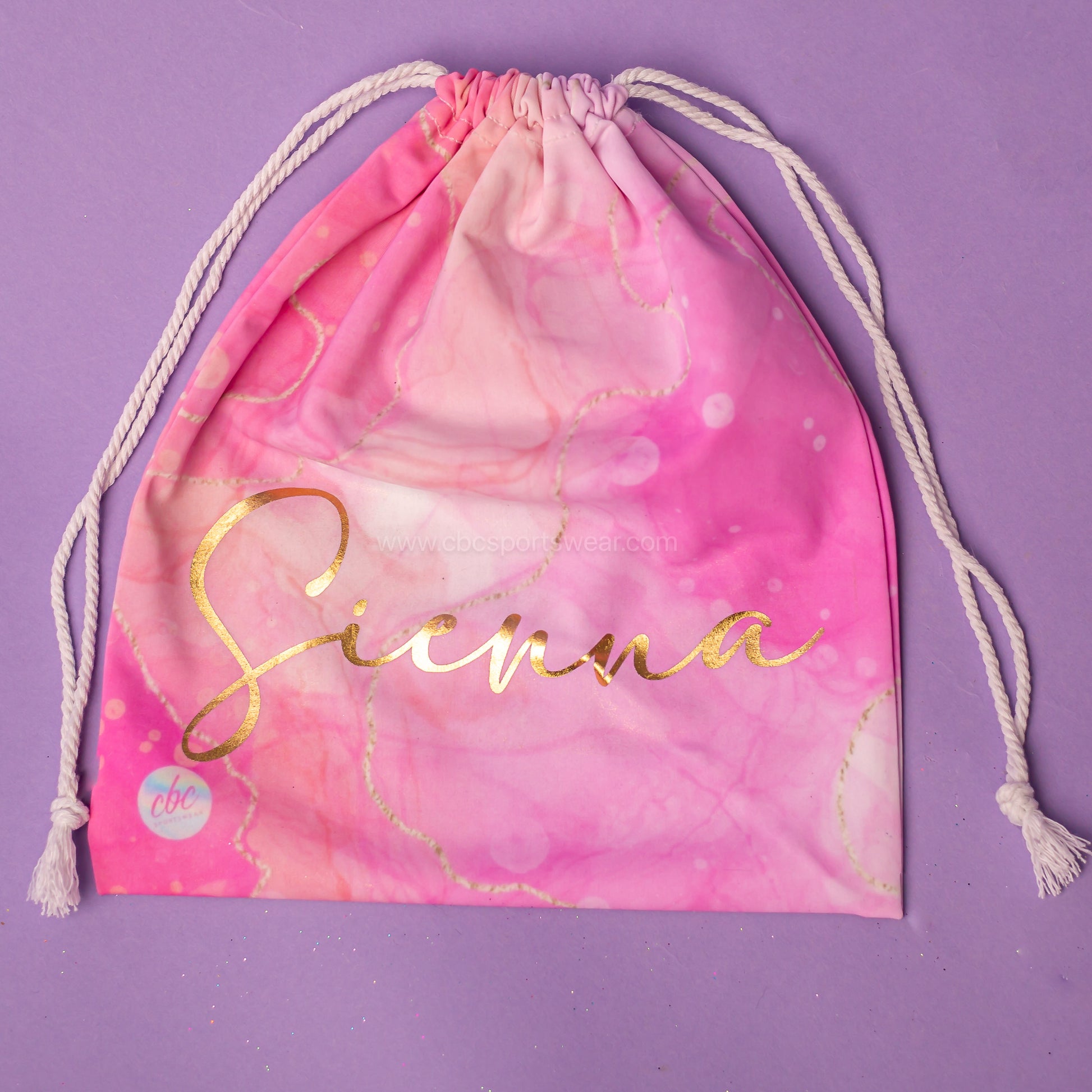 Gold marble grip bag in pink and orange marble, cbcsportswear