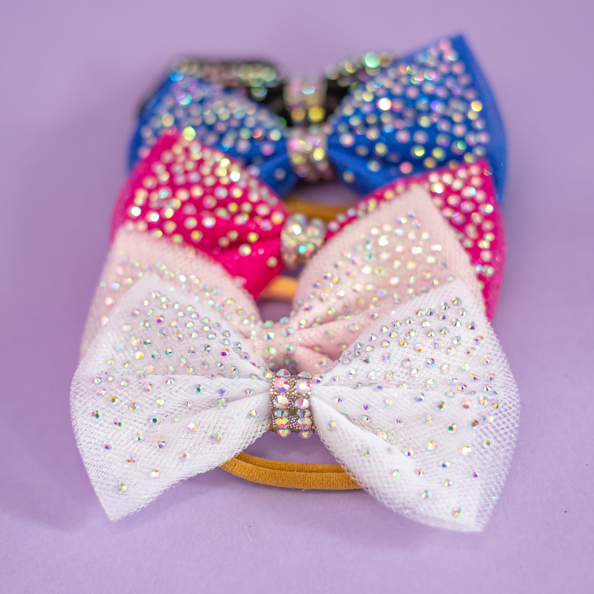 Rhinestone dipped hair bow catching the light, cbcsportswear